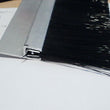 To all uk, Nylon brush strip, 10 - 50mm length trim. Suitable for garage doors. Buy in multiples. (Each on 0.89m length).