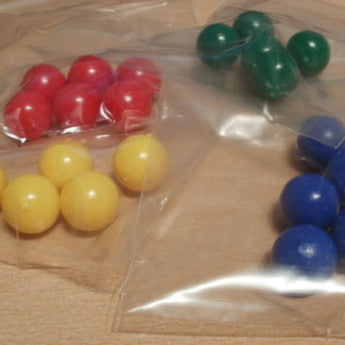 4 colours X 5 mix of 19mm diameter PVC balls. Do not float.