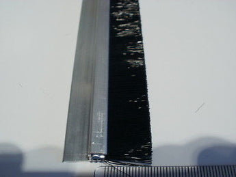 Nylon brush strip, between 10mm - 50mm length trim. Suitable for house doors or garage doors in multiples.