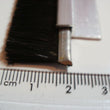 Garage door draught excluder sealing strip. 15mm long brush, 2 at 1100mm.
