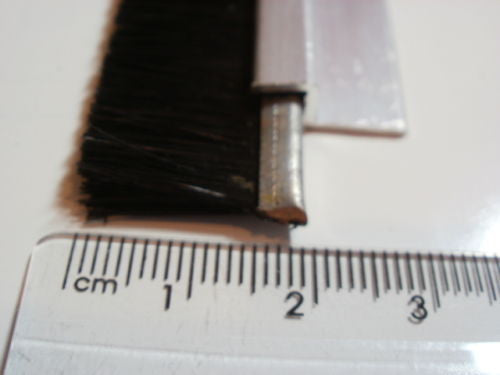 Garage door draught excluder sealing strip. 15mm long brush, 2 at 1100mm.